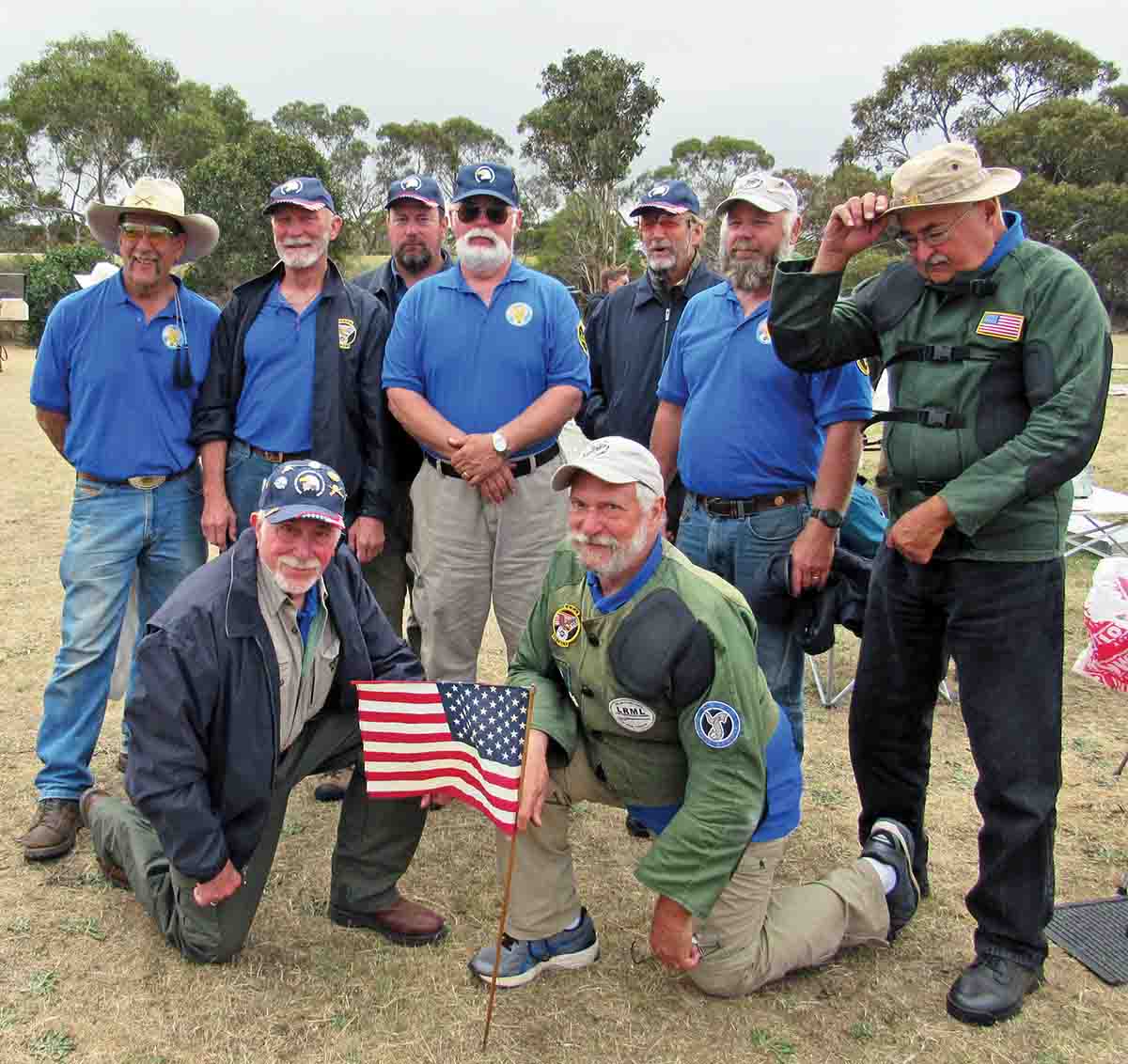 U.S. Squad, back row: Dave Gullo, Kenn Heismann, Art Fleener, Ray Hanson, Brent Danielson, Charles Scott and Ray Hopkins. Front row: Captain Ed Decker and Dave Munch.